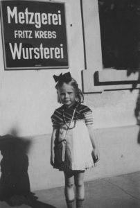Katharina in front of her father's butcher's shop in 1945. Katharina in front of her father's butcher's shop in 1945.