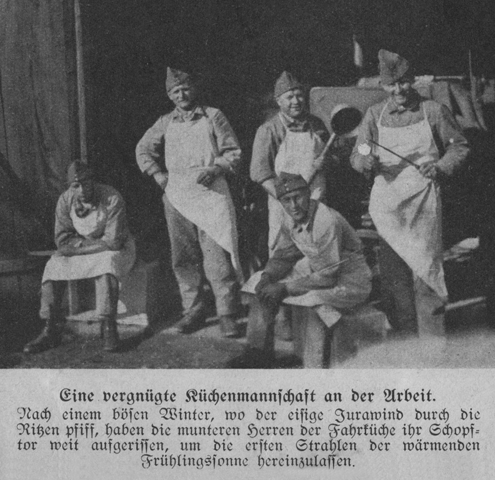 Kitchen crew in a Swiss Army field kitchen. Kitchen crew in a Swiss Army field kitchen.